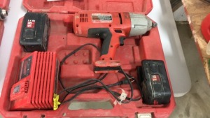 Milwaukee half-inch impact wrench with case and batteries