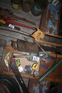 Creeper, air pump, tape measures, saws, squares
